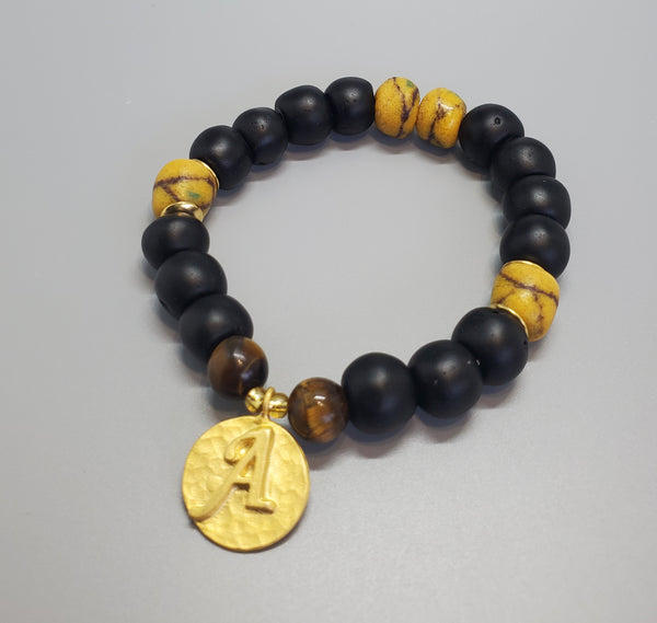 Black, Must. Krobo Beads, Tiger Eye, 22K Gold Plated Plated Brass "A" Charm, Brass, Unisex Stretch Bracelet