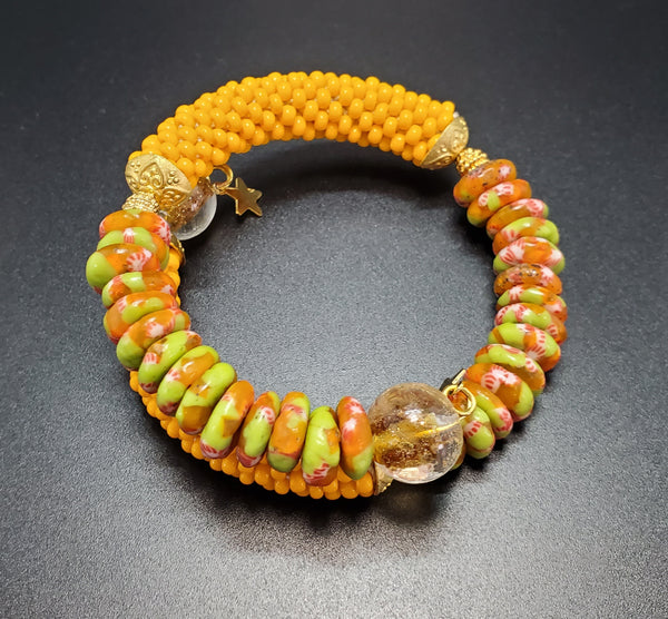 Green Orange Multi Krobo Beads, Light Orange Czech Seed Beads, Amber Lampwork, Brass Beaded Crochet Bangle